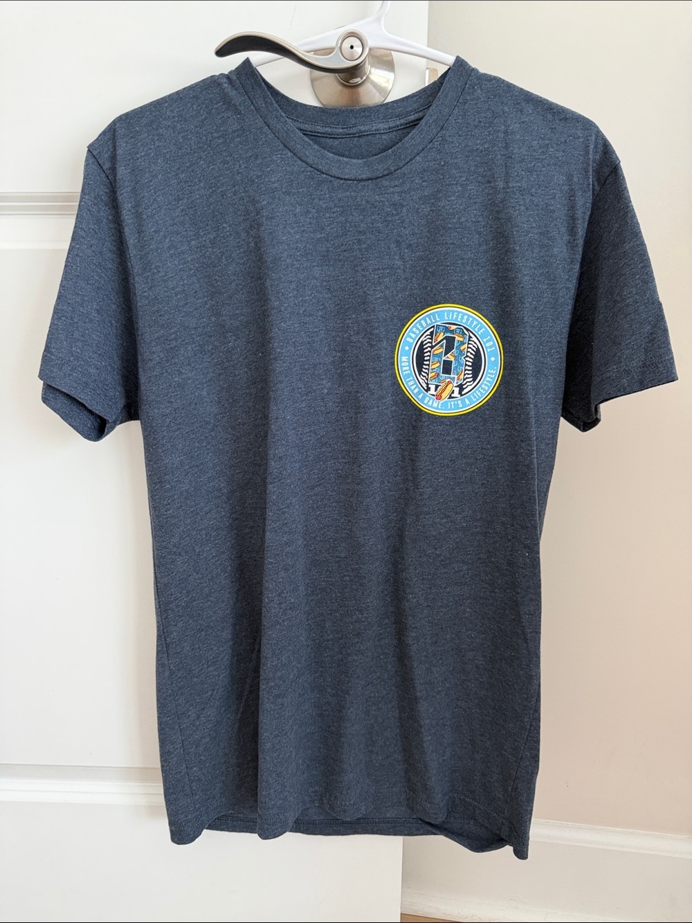 Baseball Lifestyle: Heather Navy Graphic Pocket-Style T-Shirt